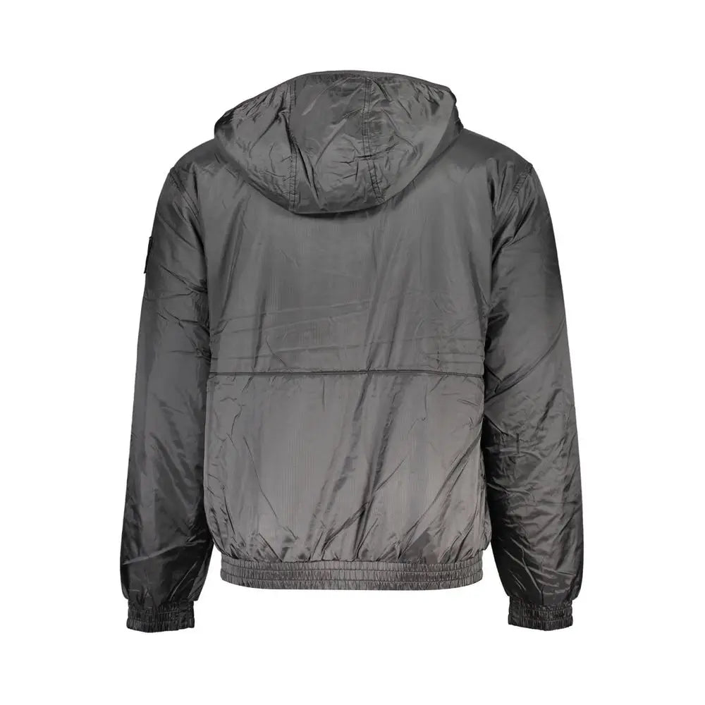 Veste noire en polyester pour homme calvin klein en nylon matelassé gris foncé brillant avec capuche et poignets élastiques