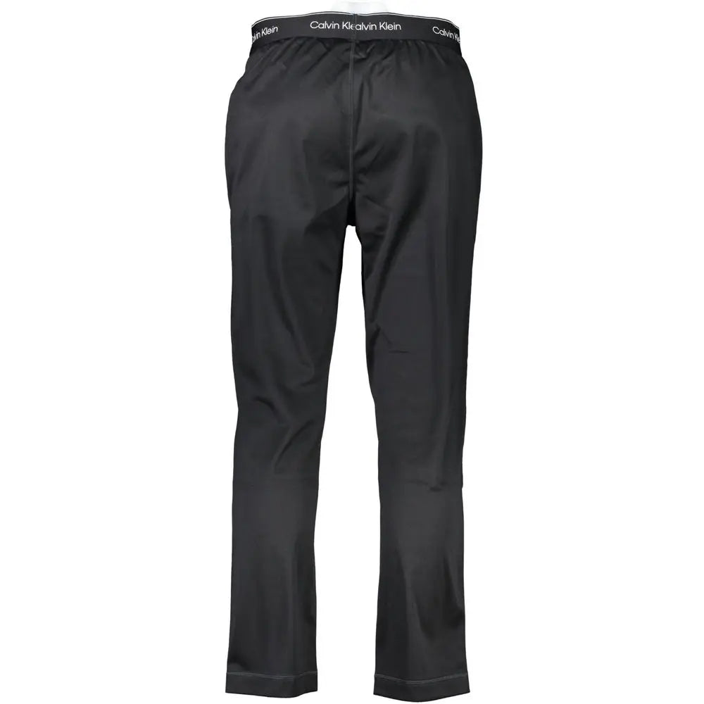 Pantalon de survêtement calvin klein noir en polyester pour homme avec tissu lisse et logo blanc discret à la taille