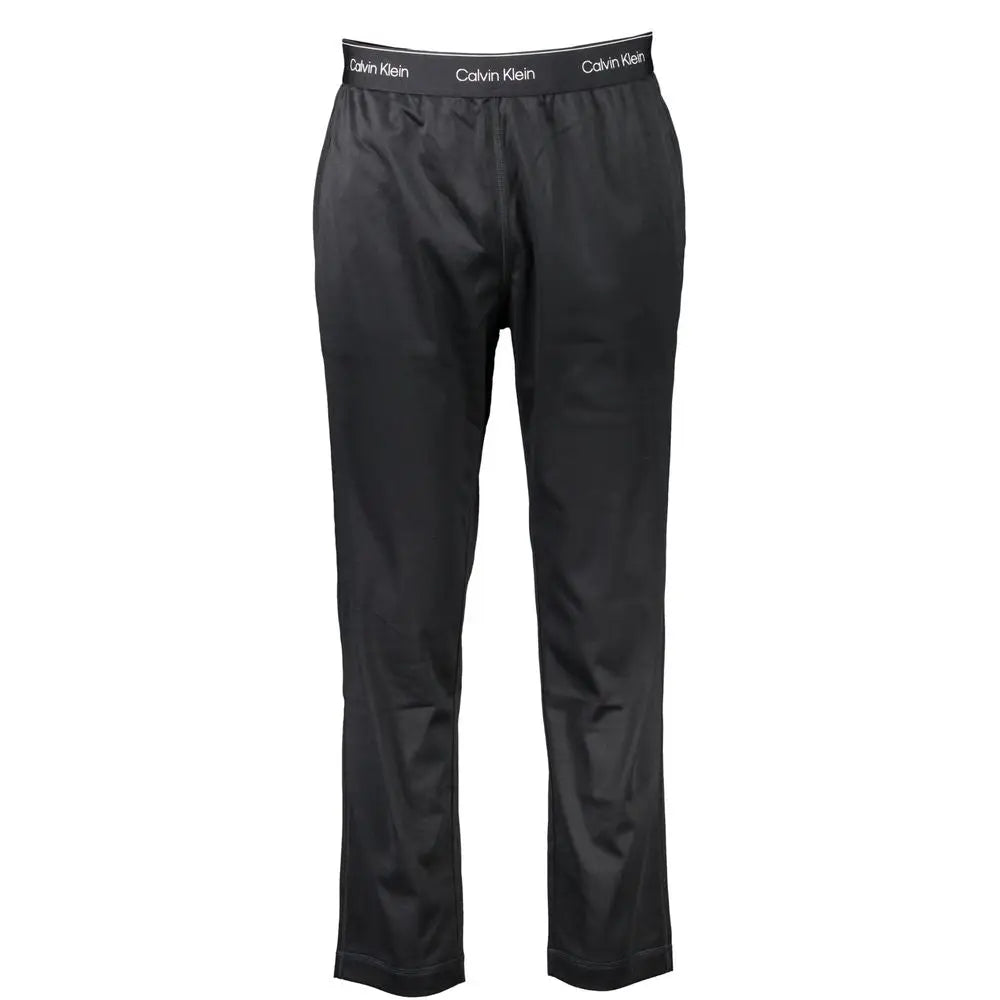 Pantalon de survêtement noir calvin klein homme en polyester avec finition satinée et logo répété sur la ceinture élastique