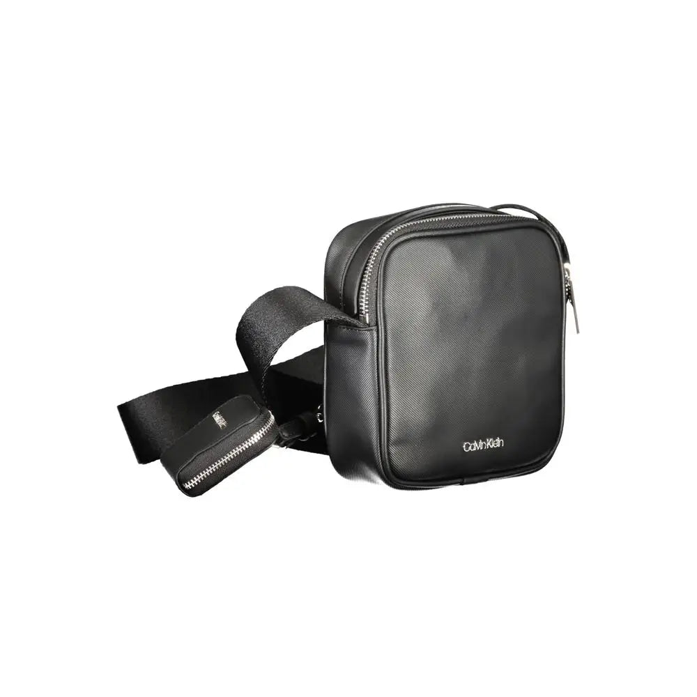 Calvin klein sac bandoulière homme noir en polyuréthane avec surface texturée et fermetures éclair argentées