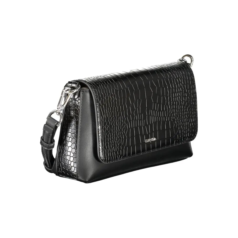 Sac bandoulière Calvin Klein noir en cuir polyurethane embossé crocodile avec ferrures argentées et bandoulière amovible