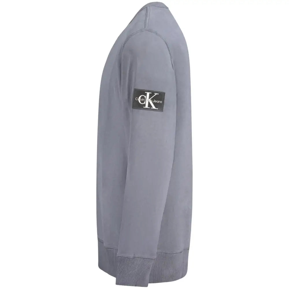 Sweatshirt calvin klein gris en coton avec patch logo noir sur la manche gauche pour homme
