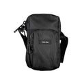 Sac bandoulière calvin klein noir élégant en tissu texturé avec détails zippés chics