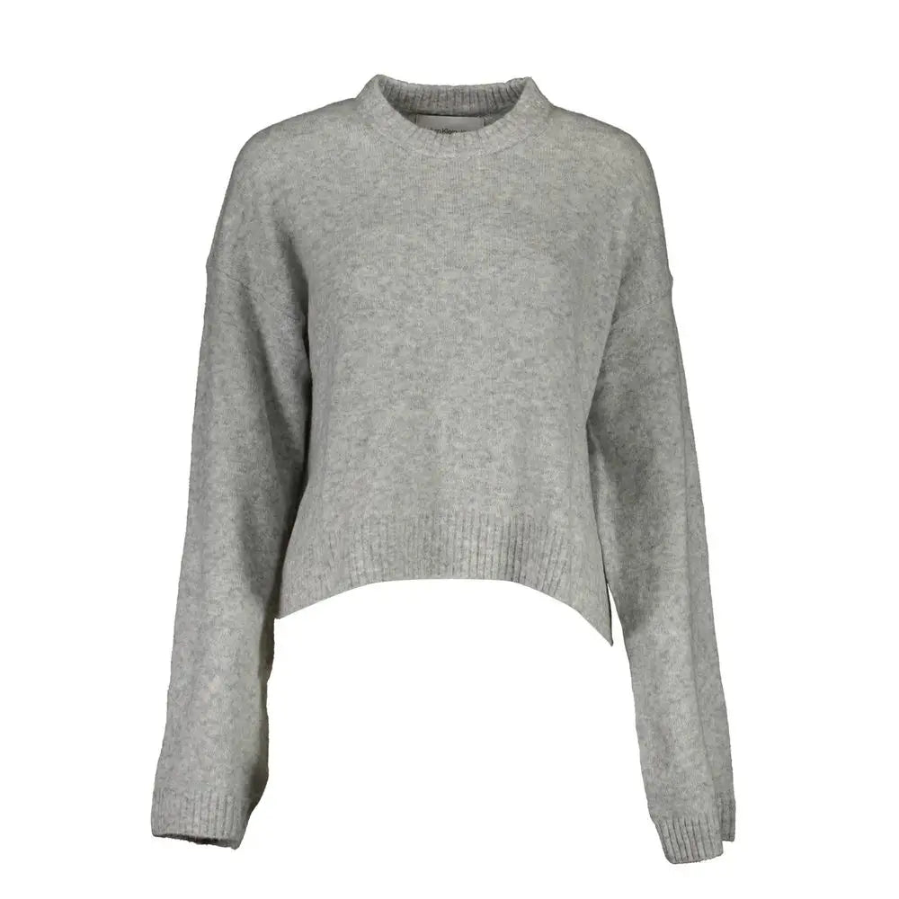 Un pull court en maille gris chiné calvin klein en acrylique pour femme avec col rond et poignets côtelés
