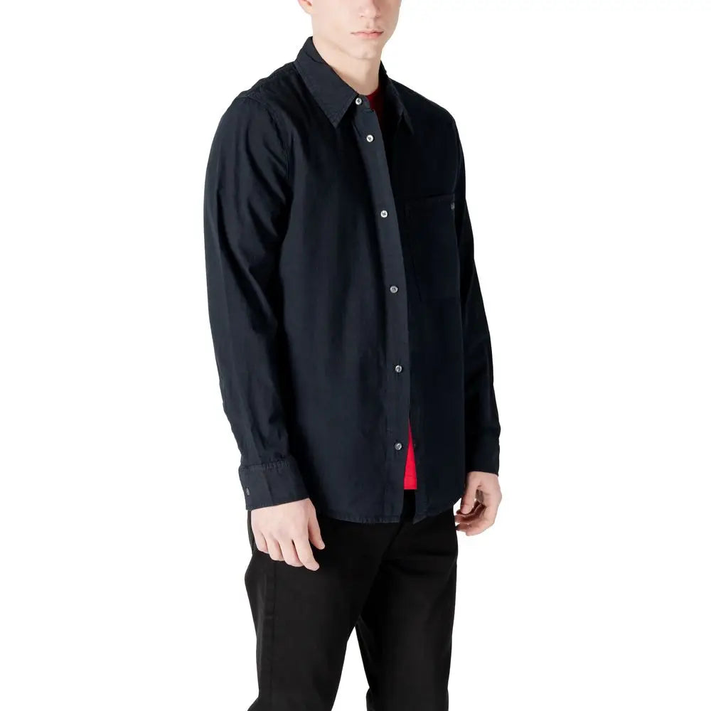 Chemise en coton noire calvin klein jeans à manches longues avec col classique et poche poitrine subtile