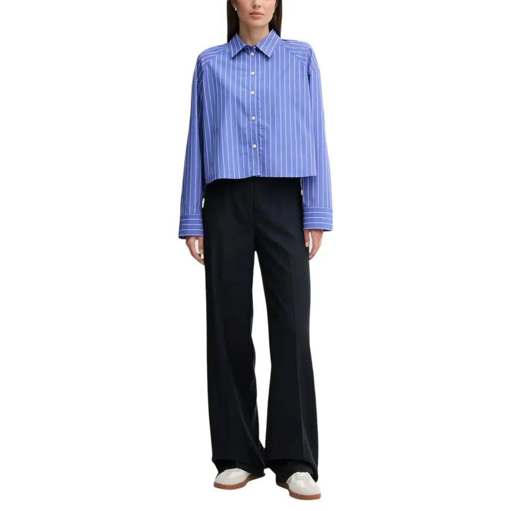 Chemise bleu et blanche à rayures verticales manches longues boutonnée en coton calvin klein jeans