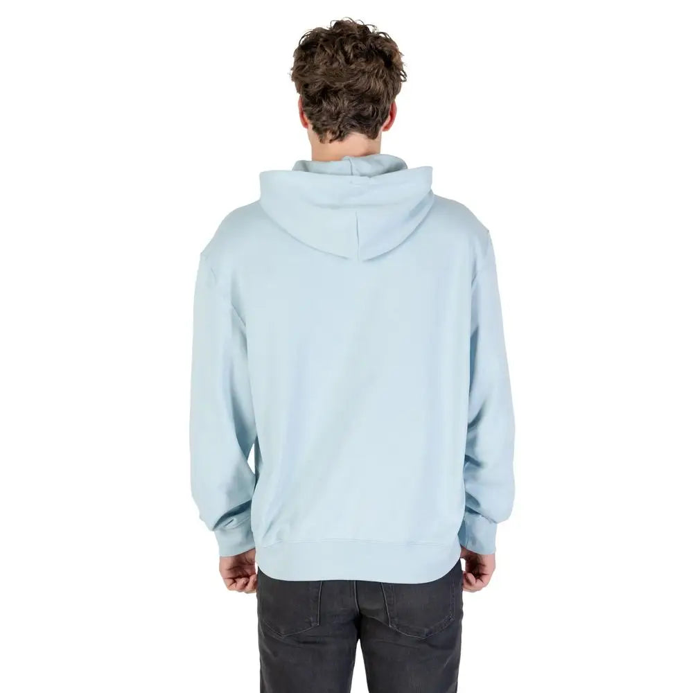 Sweat à capuche calvin klein jeans bleu clair en coton avec un design doux et décontracté