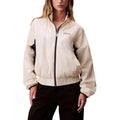 Veste Shell en polypropylene blanche de Calvin Klein Jeans, coupe décontractée avec fermeture éclair et capuche.