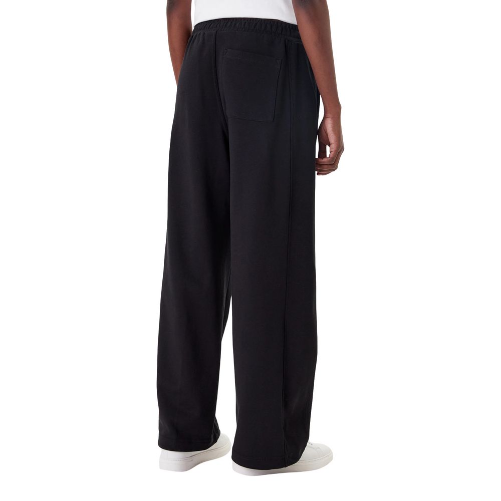 Pantalons de jogging en coton noir Calvin Klein Jeans pour entraînement, avec détails de la marque et coupe décontractée.