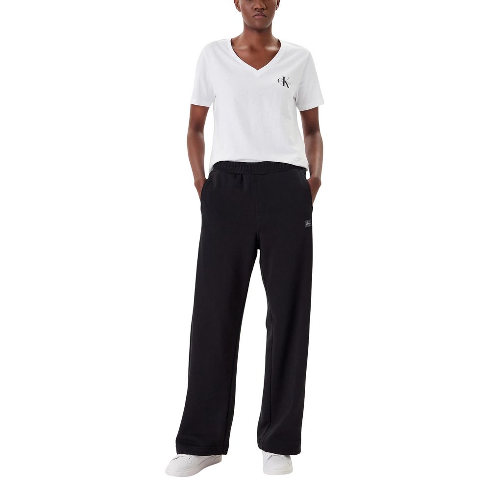 Pantalons de jogging en coton noir de Calvin Klein Jeans, style décontracté pour le sport ou la détente, visibles en image.