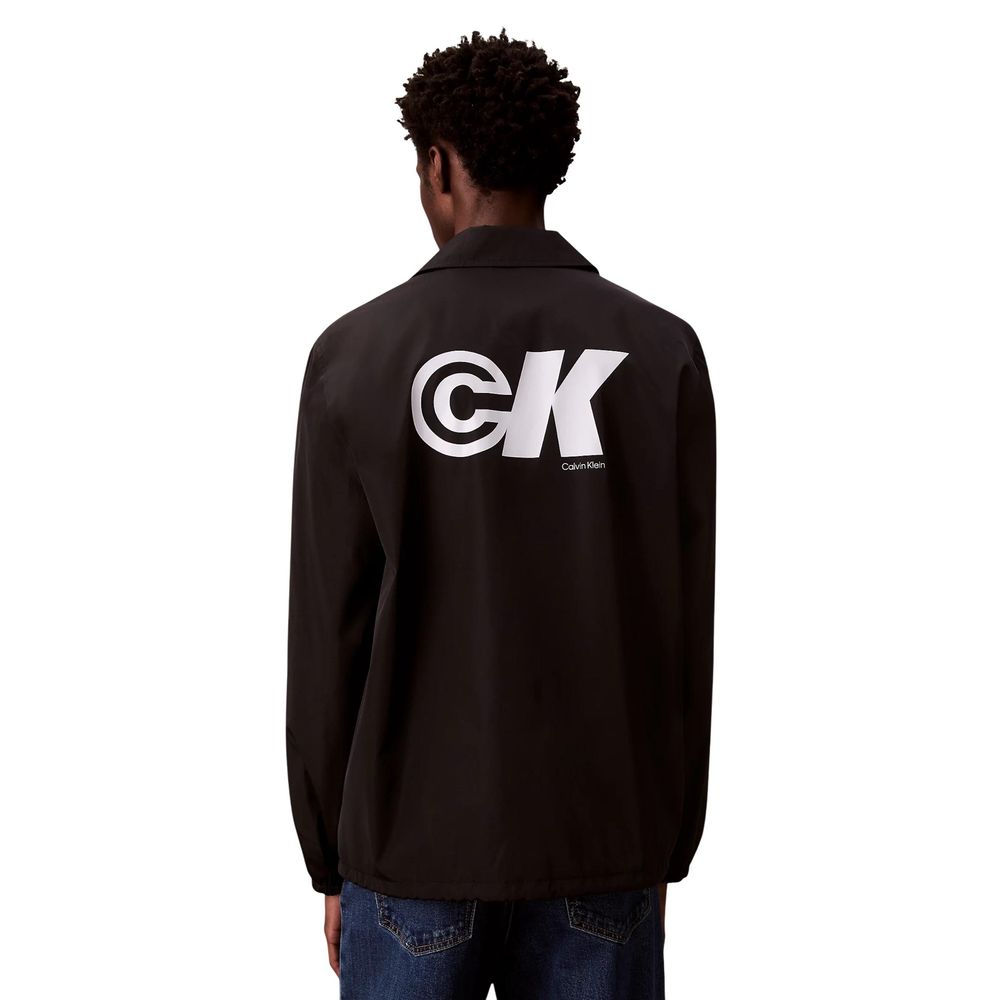 Veste en polyester noire de Calvin Klein Jeans, coupe moderne avec capuche et fermeture éclair, pour un style décontracté.
