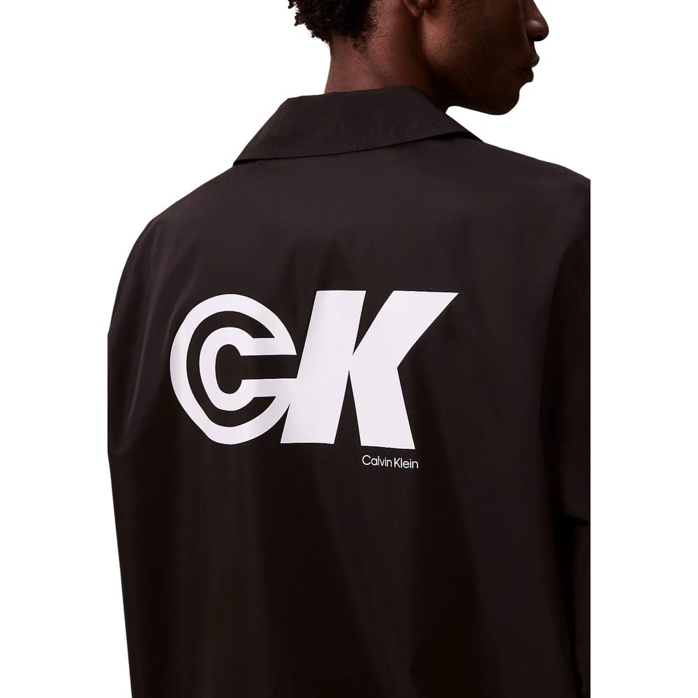 Veste en polyester noire de Calvin Klein Jeans, coupe classique, avec capuche et fermeture éclair, pour un style décontracté.
