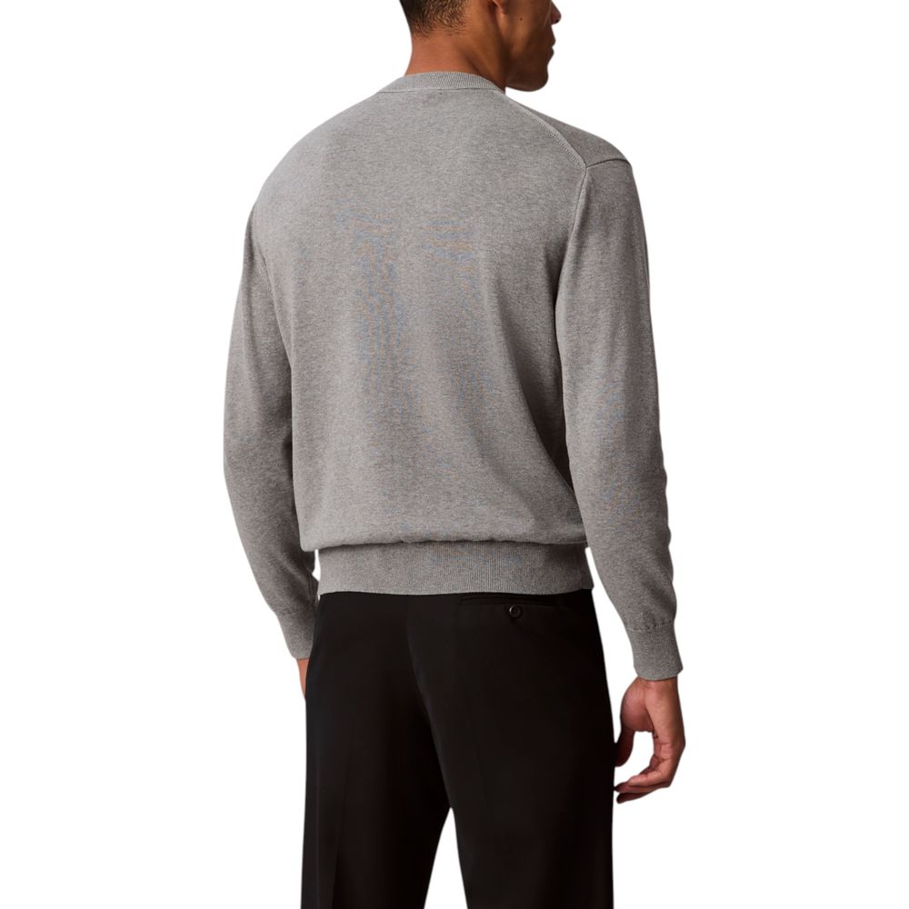 Sweatshirt gris en coton de Calvin Klein Jeans, coupe décontractée avec logo discret visible sur le devant.