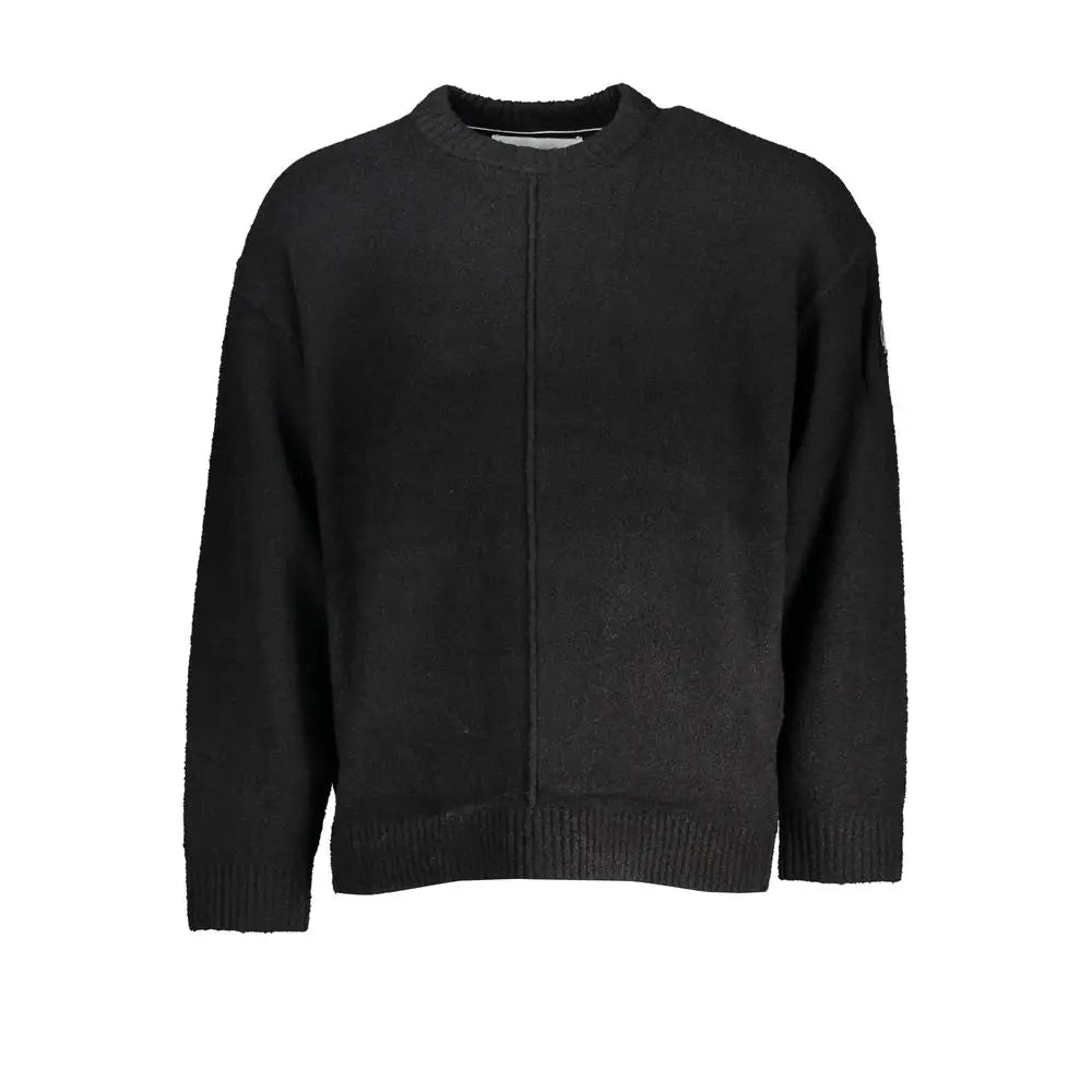 Pull en coton noir calvin klein avec couture centrale et bords côtelés aux poignets et à l’ourlet