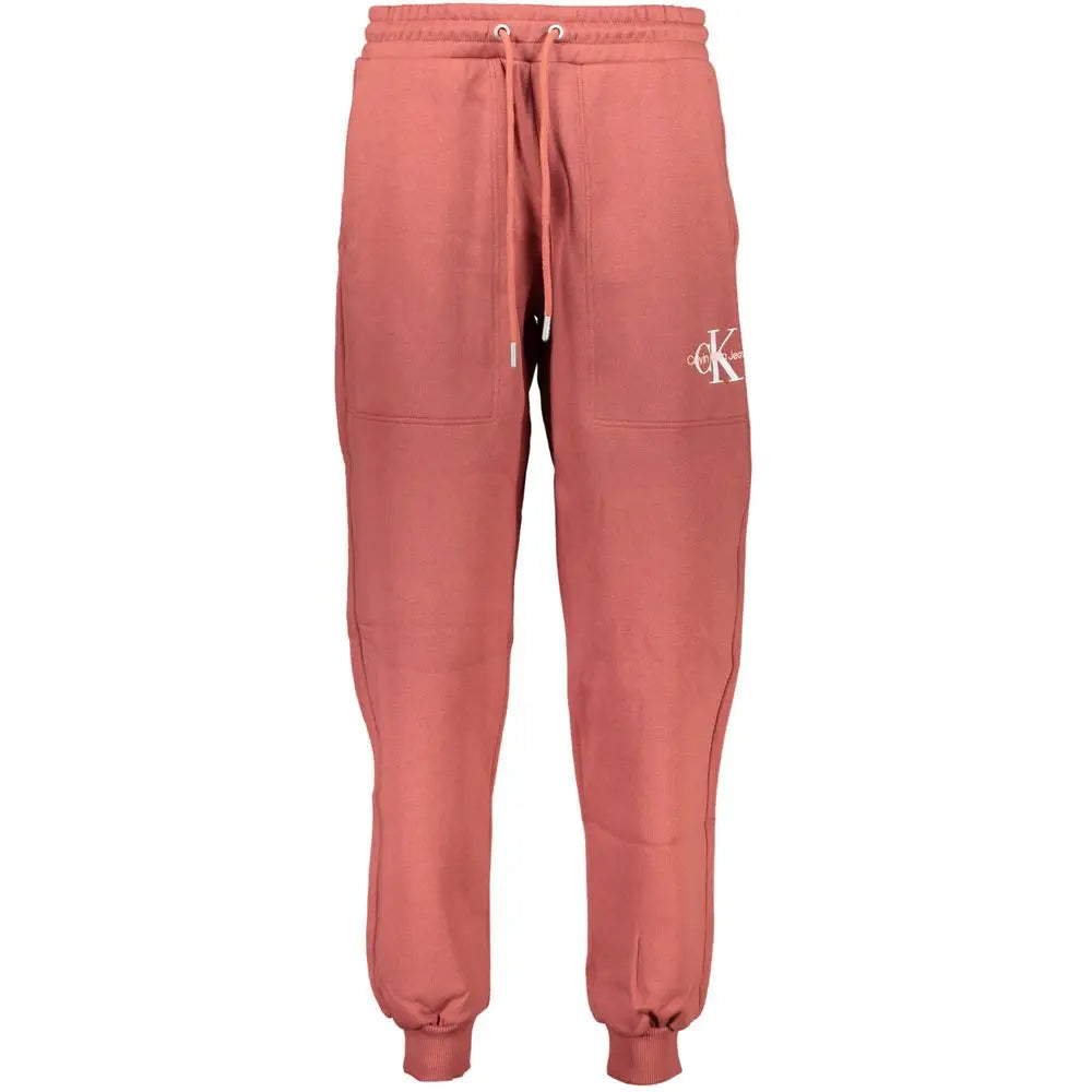 Pantalon de survêtement calvin klein rosso en coton rose avec taille à cordon et logo blanc brodé sur la cuisse gauche