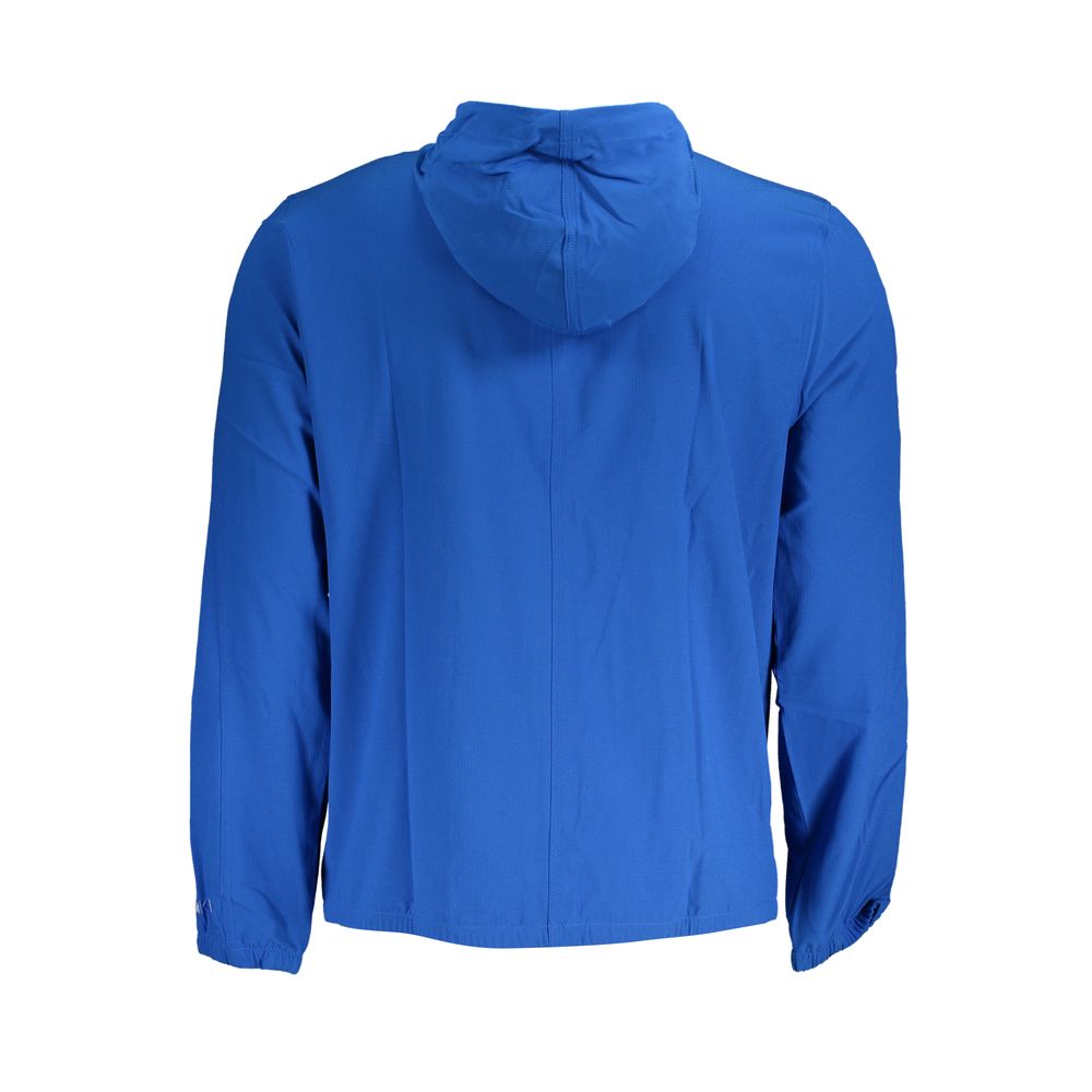 Veste de sport pour homme Calvin Klein en polyester bleu, coupe ajustée et détails modernes.