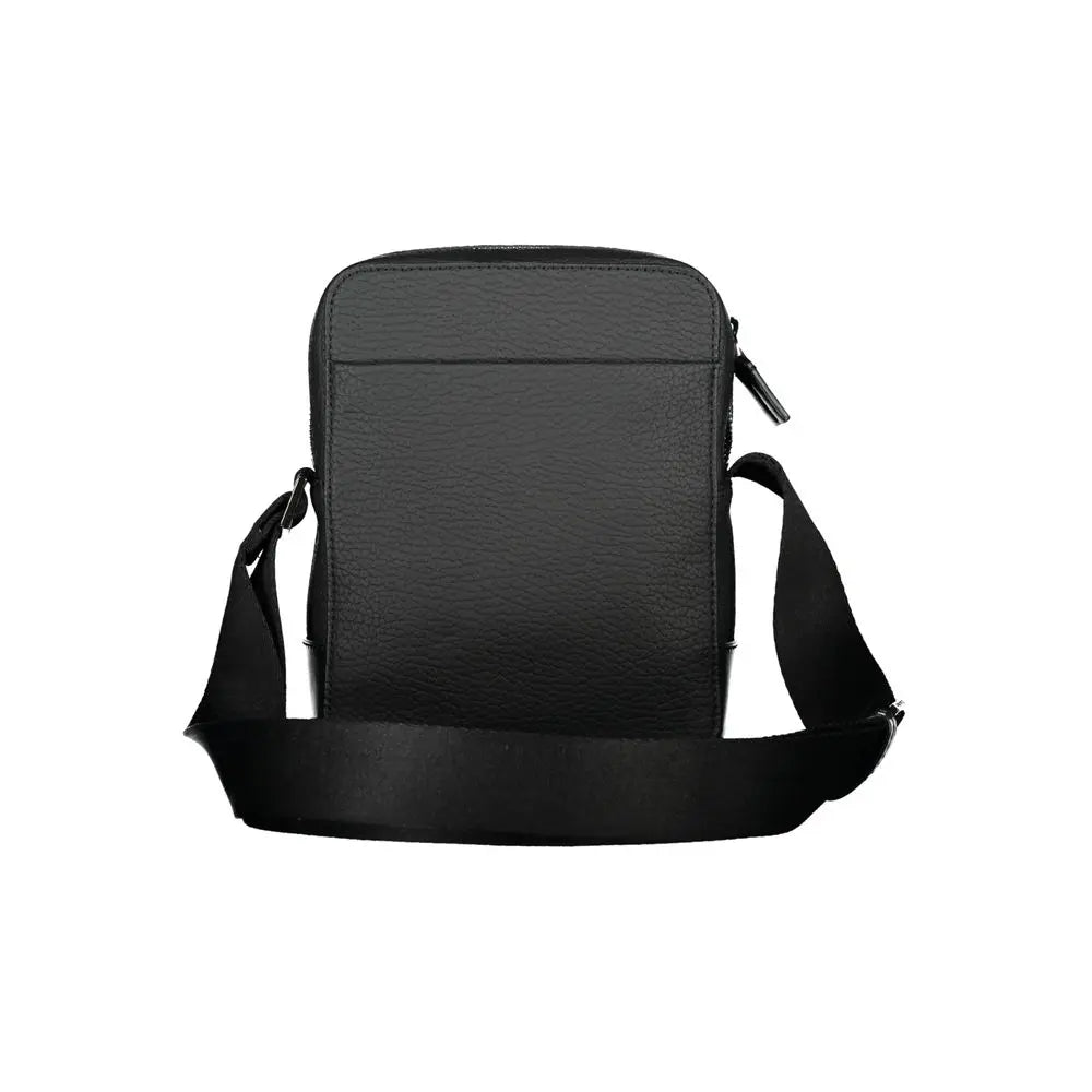 Calvin klein sac bandoulière noir en cuir texturé avec détails contrastants et sangle réglable assortie