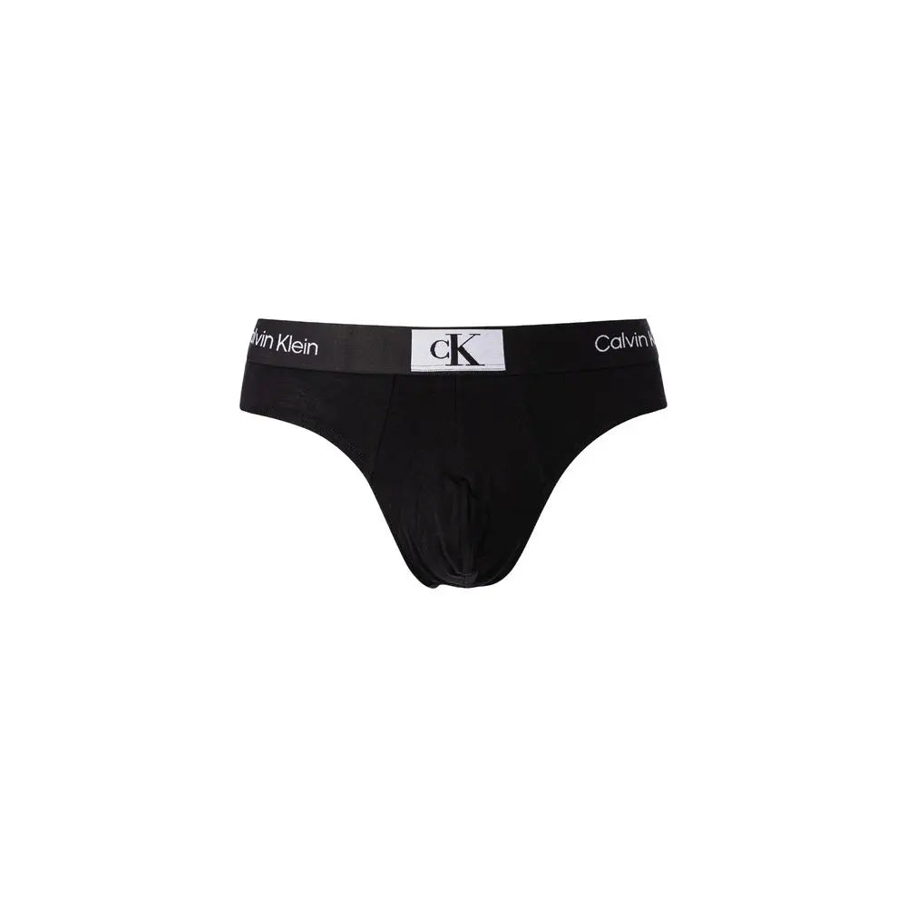 Caleçon noir en coton calvin klein avec bande logo blanche ck monogramme et nom de la marque