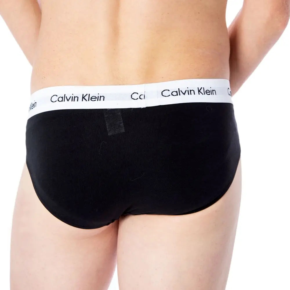 Slip calvin klein en coton noir avec ceinture blanche et logo noir pour un usage quotidien confortable
