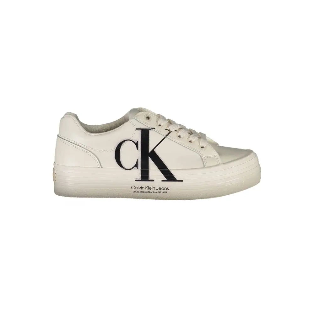 Calvin Klein white leather women sneaker with bold black ck logo and matching laces on white jeans style
