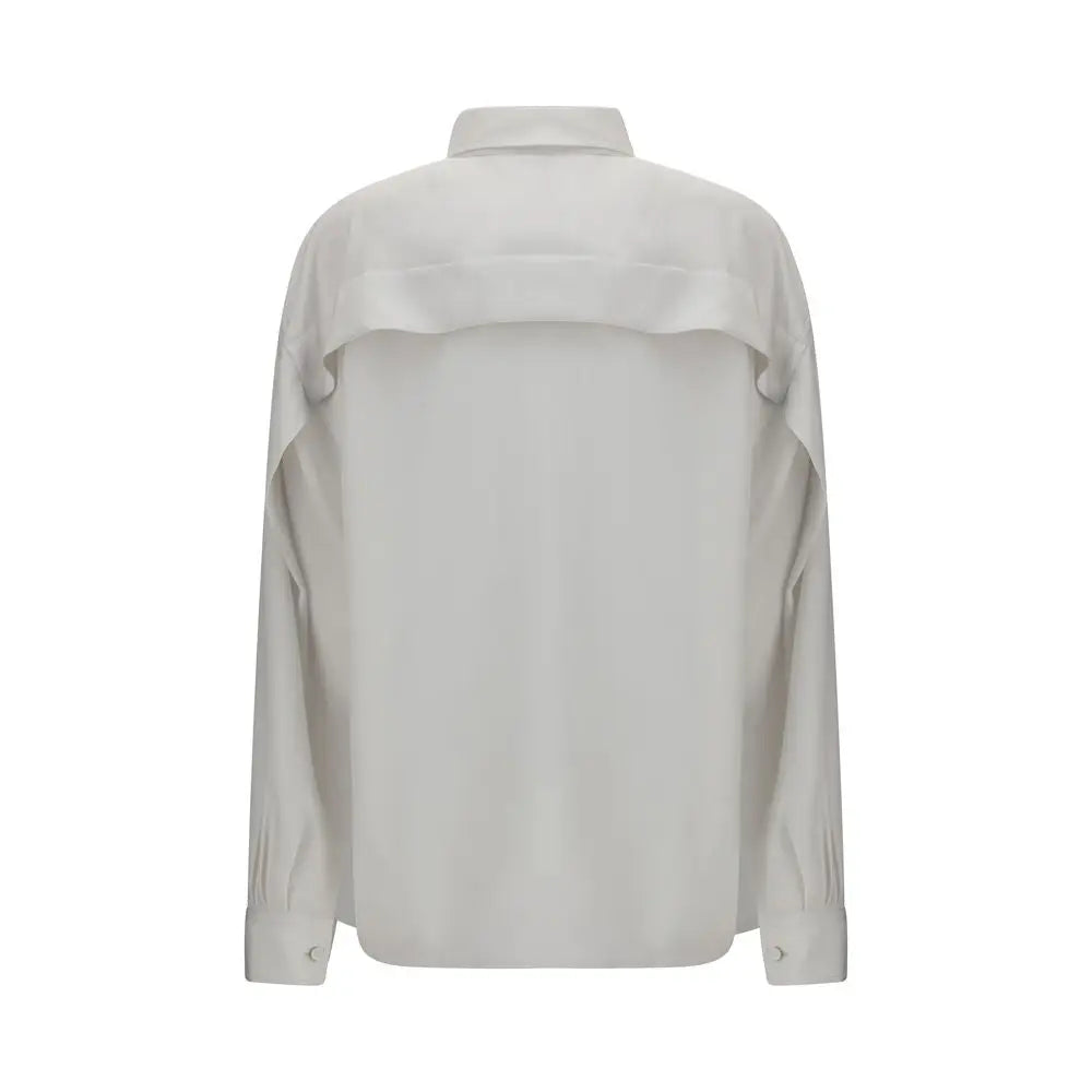 Chemise en soie blanche calvin klein élégante avec design asymétrique moderne et détail volanté aux épaules