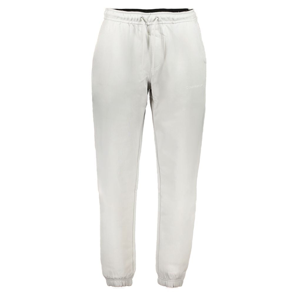 Pantalon de sweat en coton gris pour homme de la marque Calvin Klein, vue de face, avec logo discret.