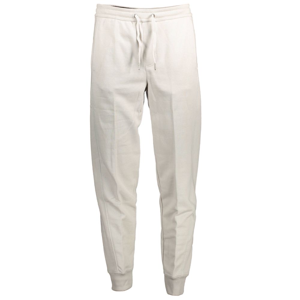 Pantalon de sweat en coton gris pour homme de la marque Calvin Klein, visible avec logo discret sur la jambe.