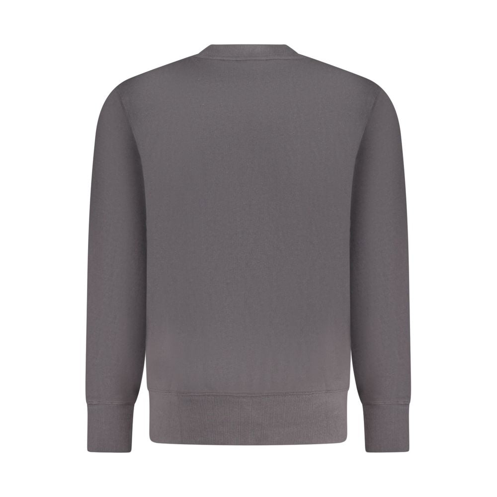 Sweatshirt en coton noir pour homme de la marque Calvin Klein, col rond et design simple, porté sur un mannequin.