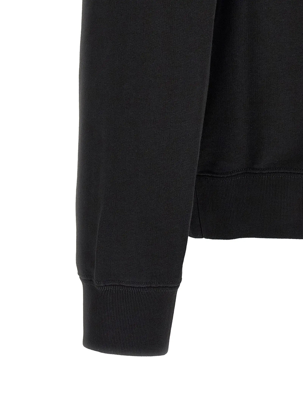 Manche en maille côtelée noire avec texture subtile et poignet ajusté du sweatshirt en coton canada goose