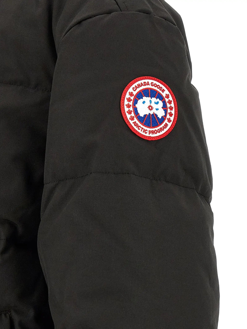 Parka canada goose noire en polyester avec patch logo circulaire rouge blanc bleu sur la manche