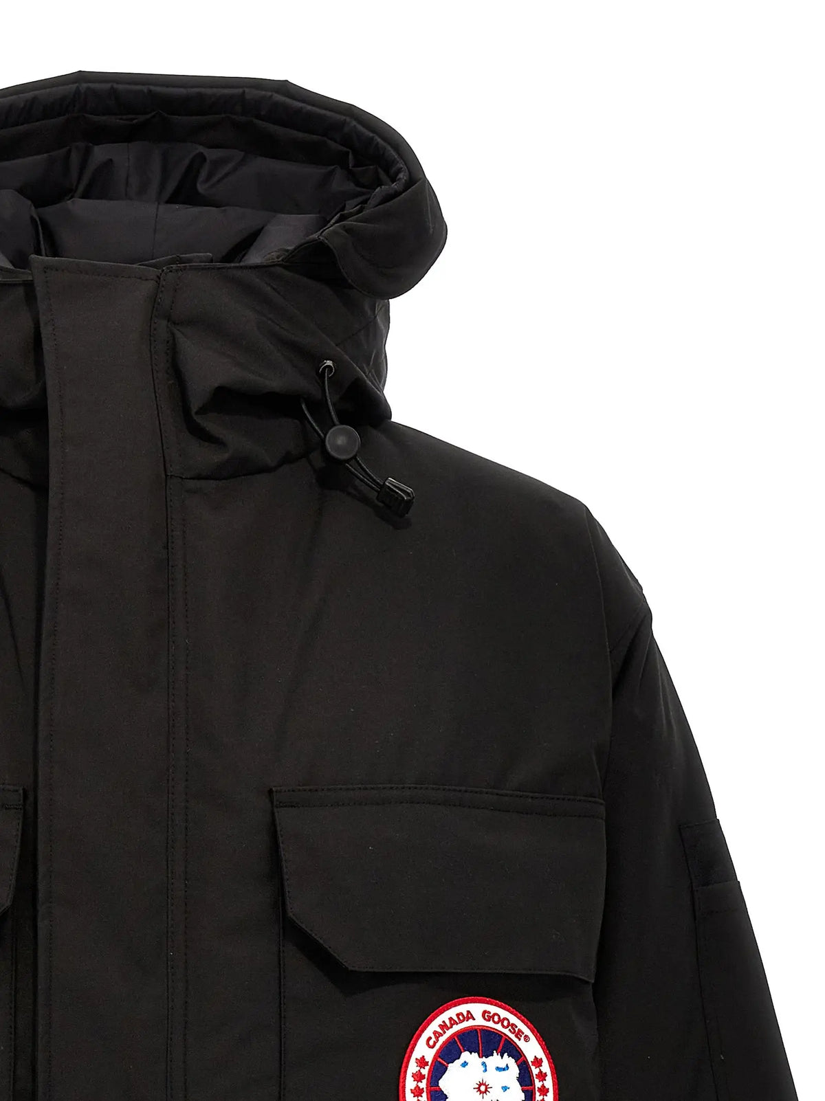 Parka canada goose noire en polyester avec capuche matelassée et logo circulaire sur la poitrine