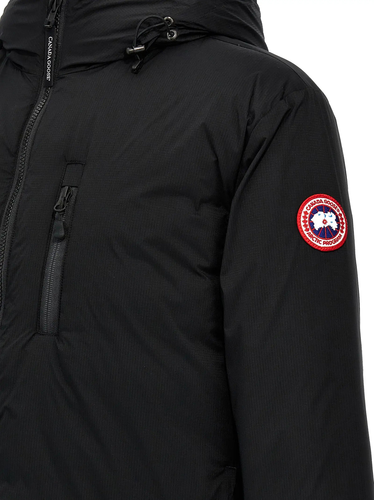 Veste canada goose noire en polyester avec parka arctique matelassée et logo circulaire rouge blanc bleu sur la manche