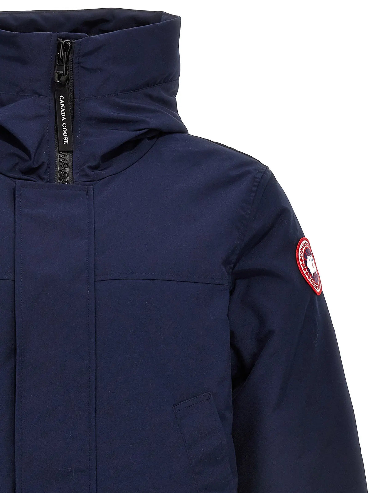 Canada Goose parka bleu en polyester avec col montant et logo rouge circulaire sur la manche