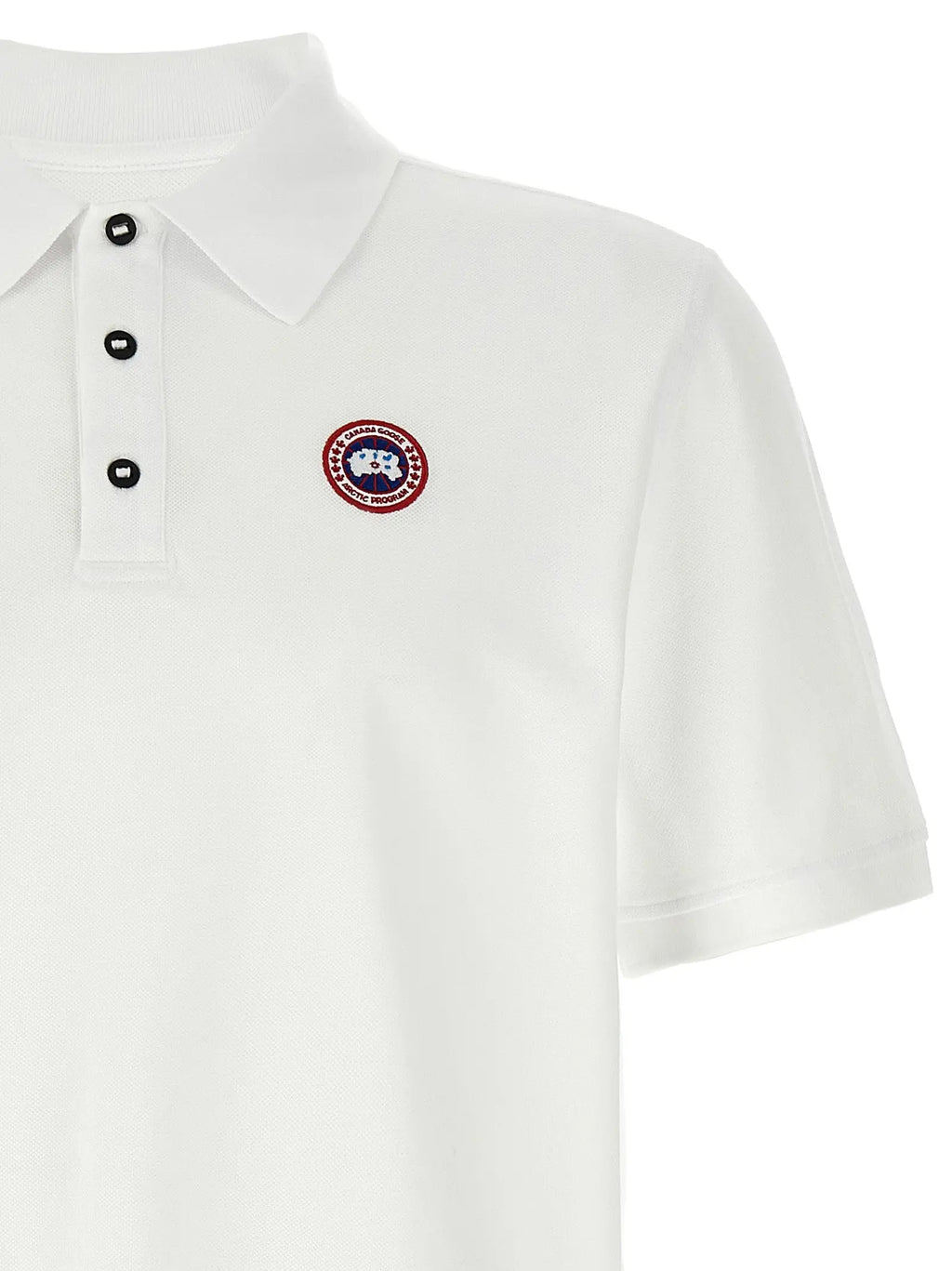 Polo blanc en coton canada goose avec boutons noirs et logo brodé circulaire sur la poitrine