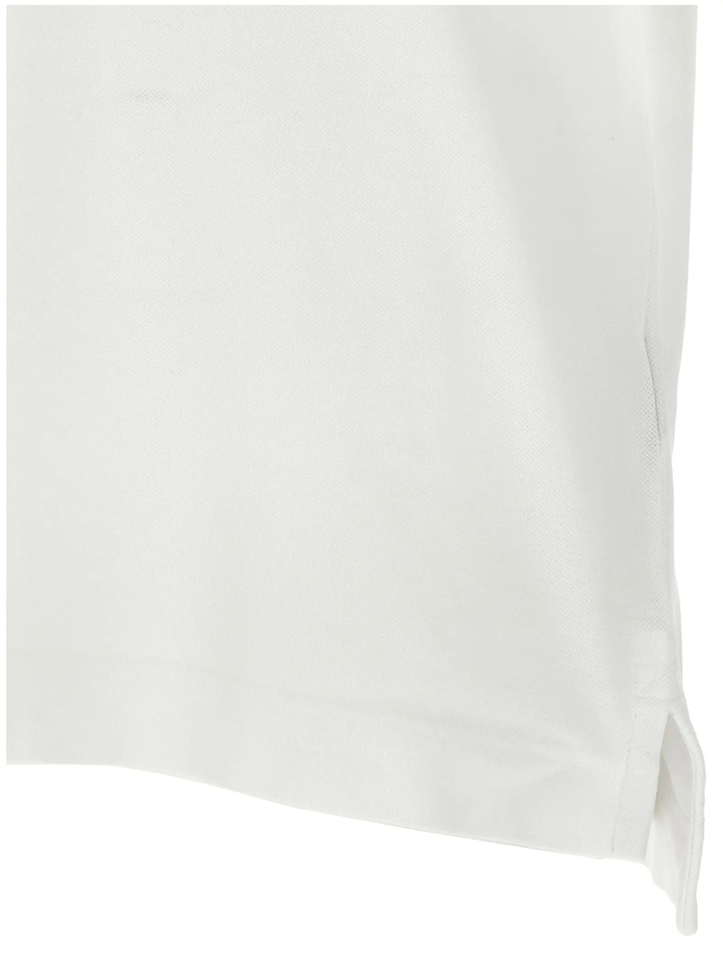 Polo canada goose blanc en coton avec texture côtelée subtile et ourlet net et ajusté