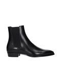 Bottines celine en cuir noir avec finition élégante et panneaux élastiques latéraux style chelsea