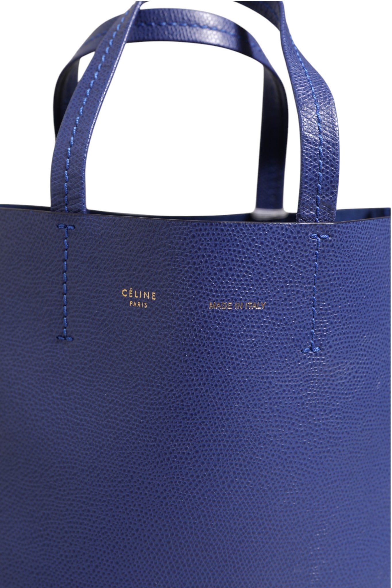Sac tote bleu avec détails dorés de la marque Celine, vue de face avec poignées en cuir.
