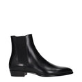 Bottes ankle en cuir noir de Celine, style élégant, avec semelle en caoutchouc et finition soignée.