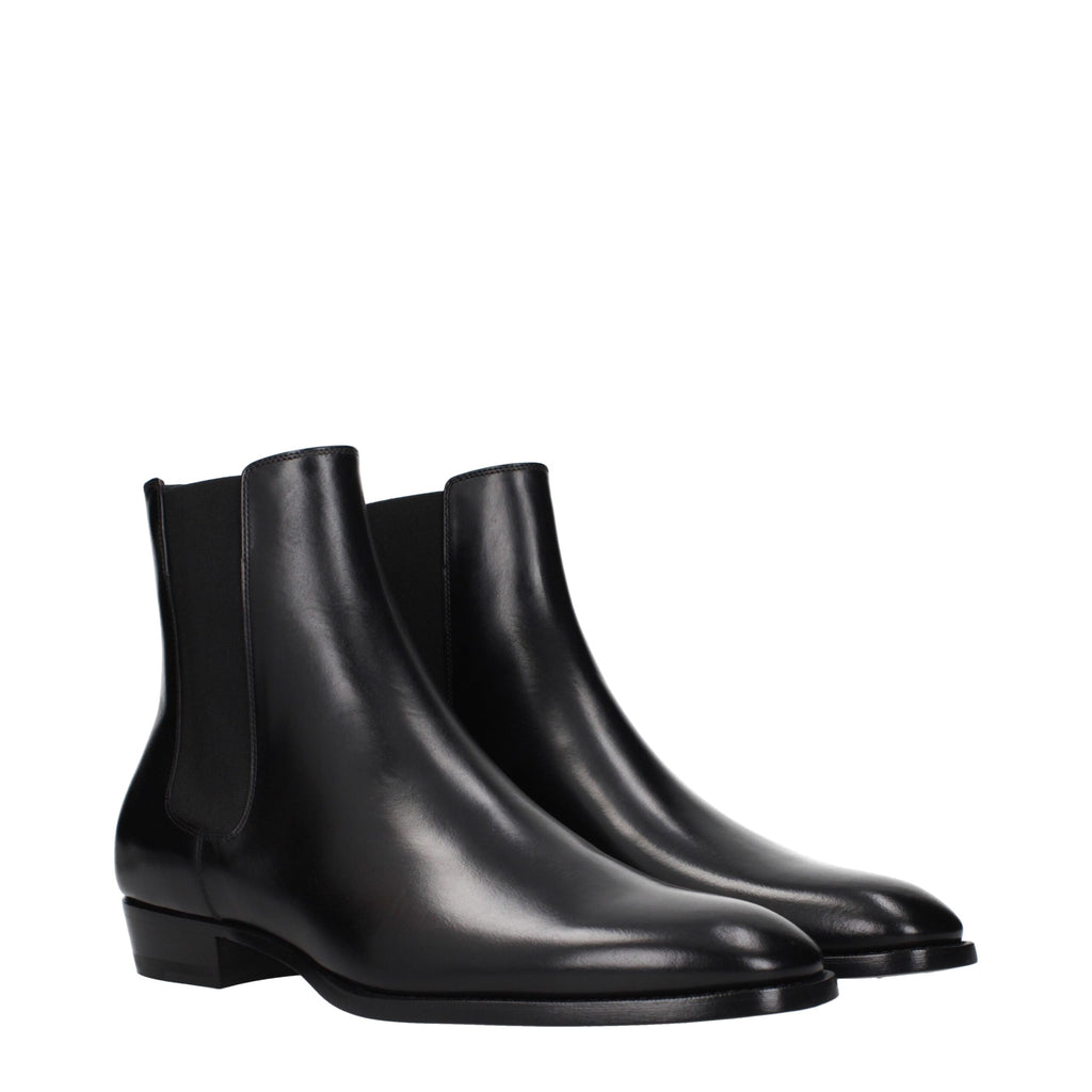 Bottes en cuir noir pour ankle de marque Celine, chaussures élégantes avec semelle en cuir et finition soignée.