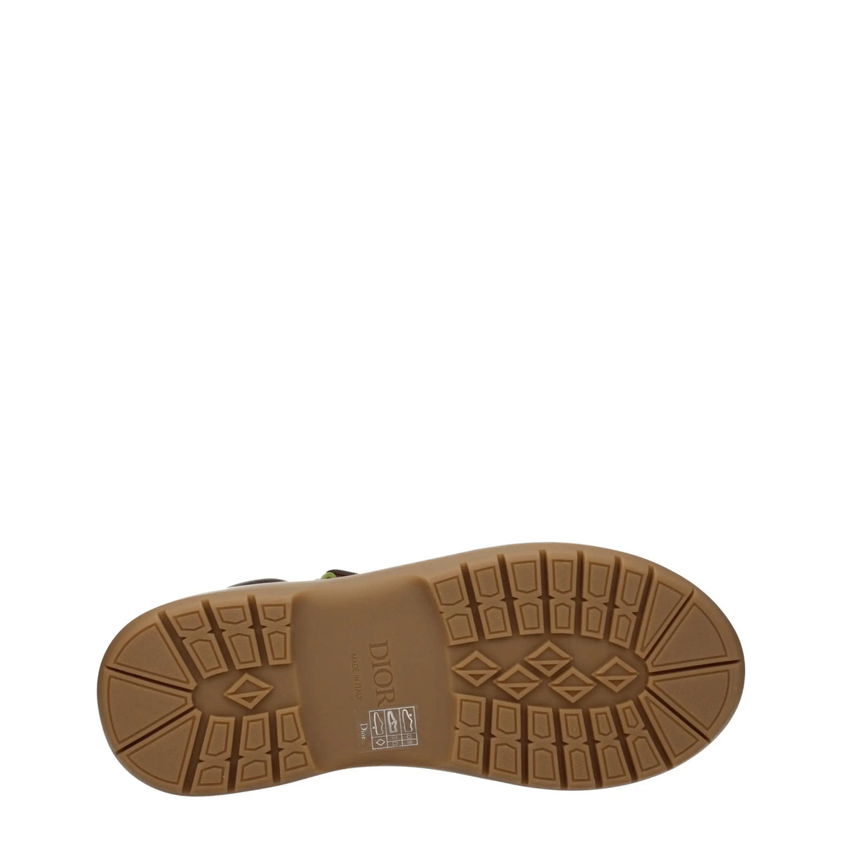 Semelle en caoutchouc beige avec motif losange embossé et étiquette dior des bottines en cuir christian dior