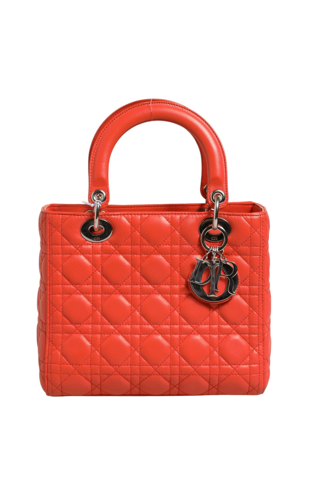 Sac à main Lady Dior en cuir de veau orange à motif Cannage, par Christian Dior, avec poignée en métal doré.