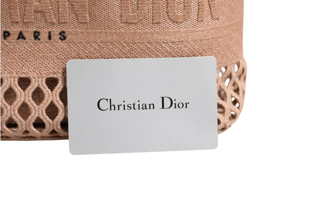 Beige christian dior travel vanity case with knitted mesh embroidered woven texture and intricate openwork design
