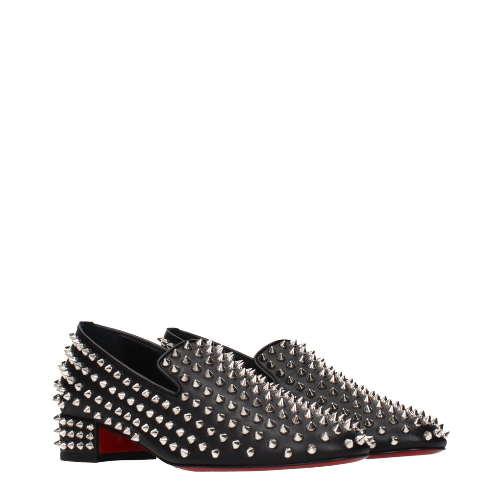 Chaussures mocassins Christian Louboutin en cuir noir, style slip-on, avec semelle élégante et détails sophistiqués.
