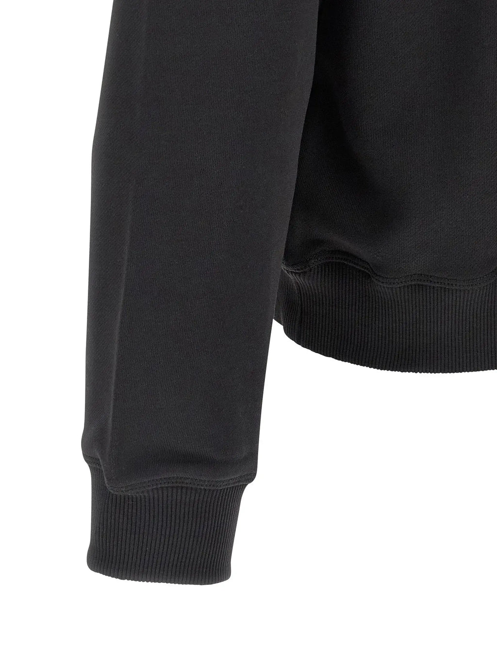 Poignet côtelé noir en maille d un sweatshirt diesel en coton doux légèrement délavé