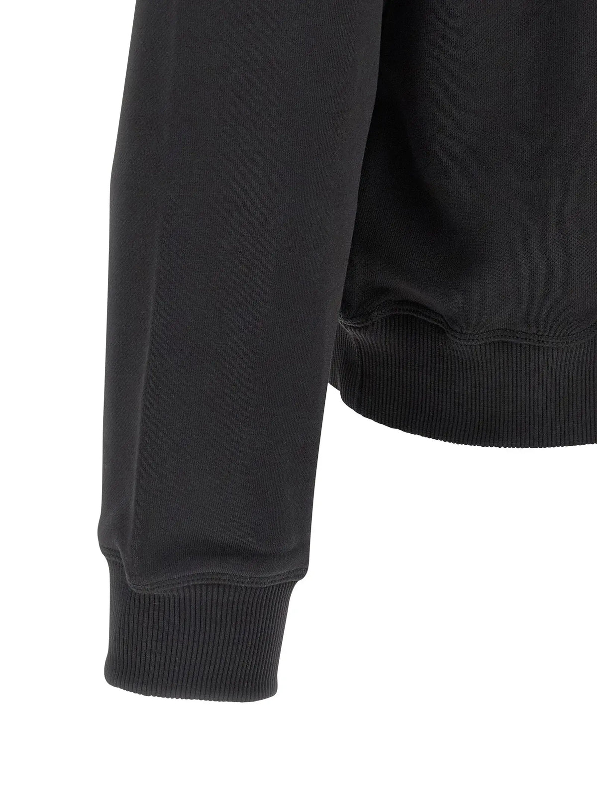 Poignet côtelé noir en maille d un sweatshirt diesel en coton doux légèrement délavé