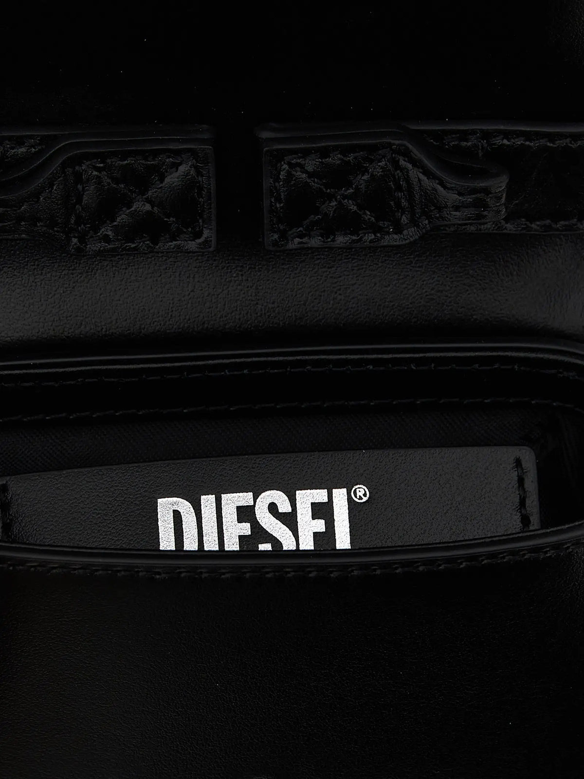 Portefeuille diesel noir en cuir de vachette avec logo embossé et coutures détaillées pour sac à main