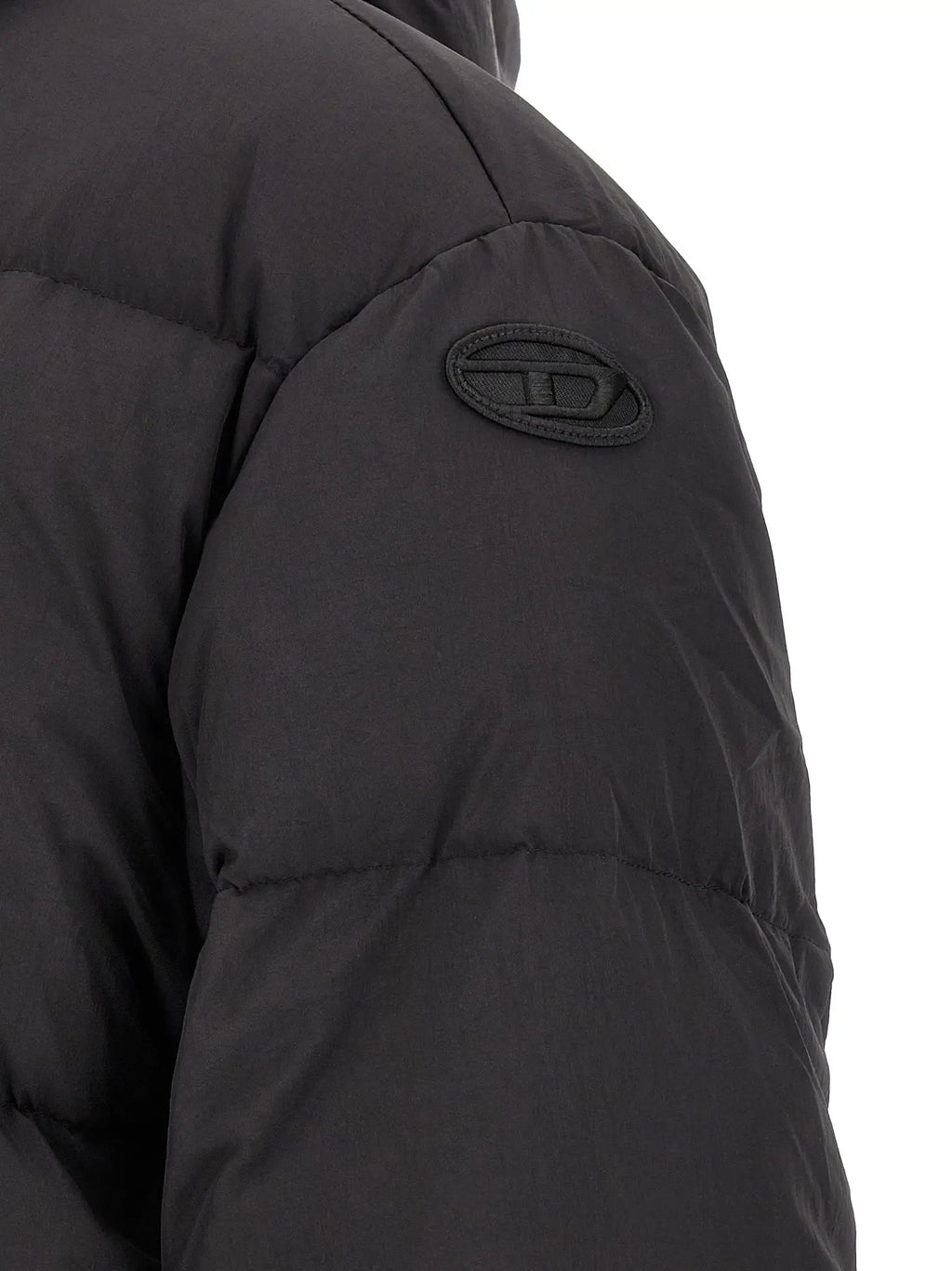 Veste polyamide noire pleine longueur diesel avec couture matelassée et patch logo ovale assorti sur l’épaule