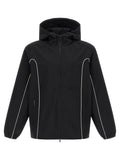 Veste diesel noire en coque polyamide avec capuche et piping blanc sur les manches et les coutures latérales