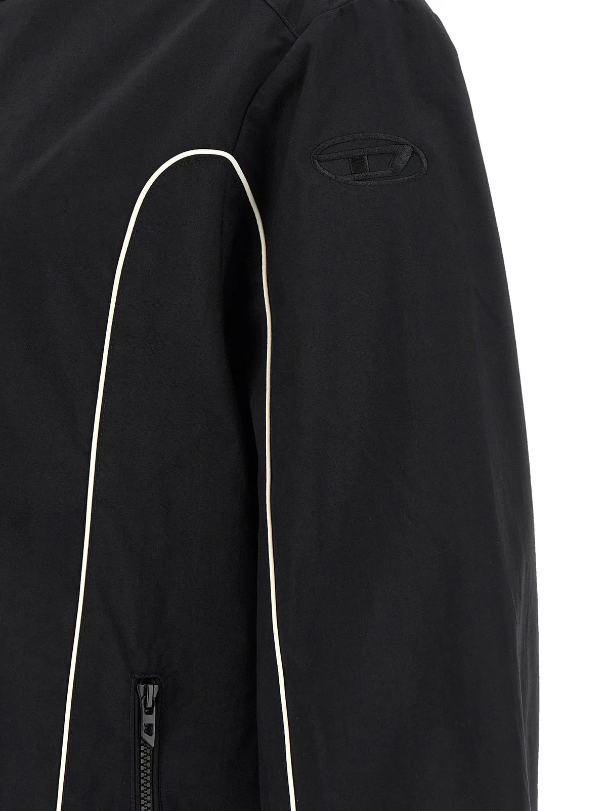 Veste noire en polyamide diesel avec passepoil blanc sur la manche et logo brodé discret sur lépaule