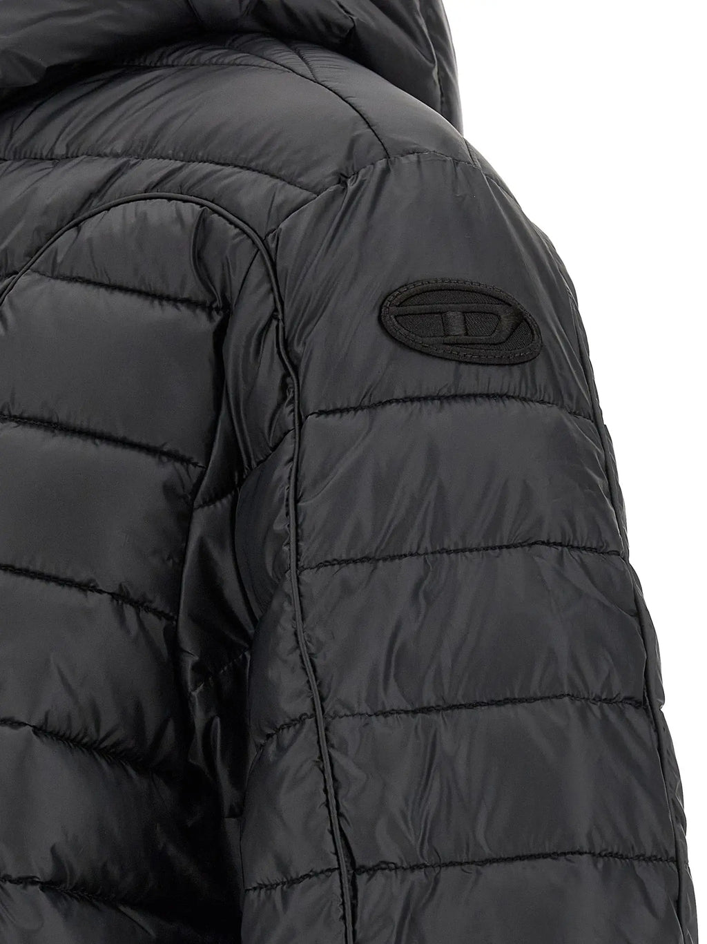 Veste longue diesel noire en polyester matelassée avec léger brillant et patch logo brodé sur lépaule